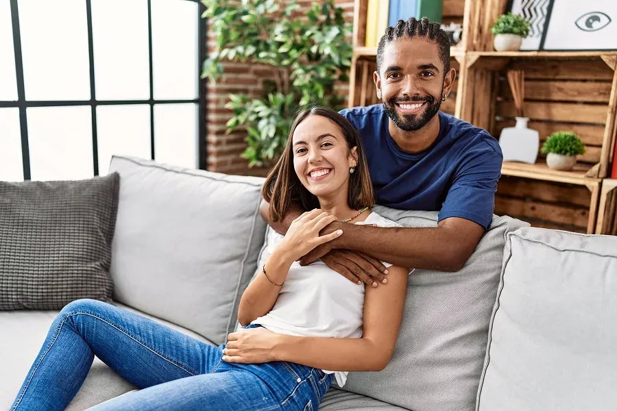 A happy couple who are leaving reviews after their move.